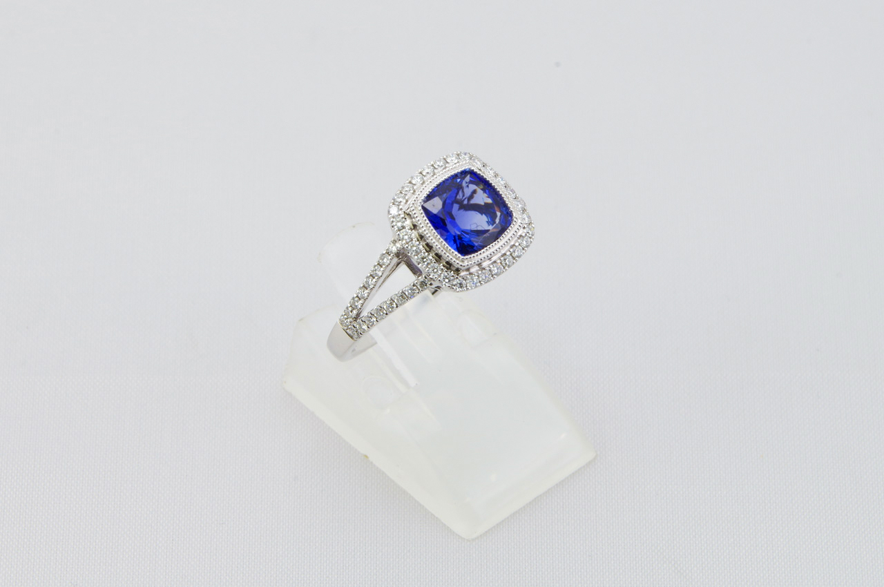 White Gold Cushion Tanzanite And Diamond Halo Ring